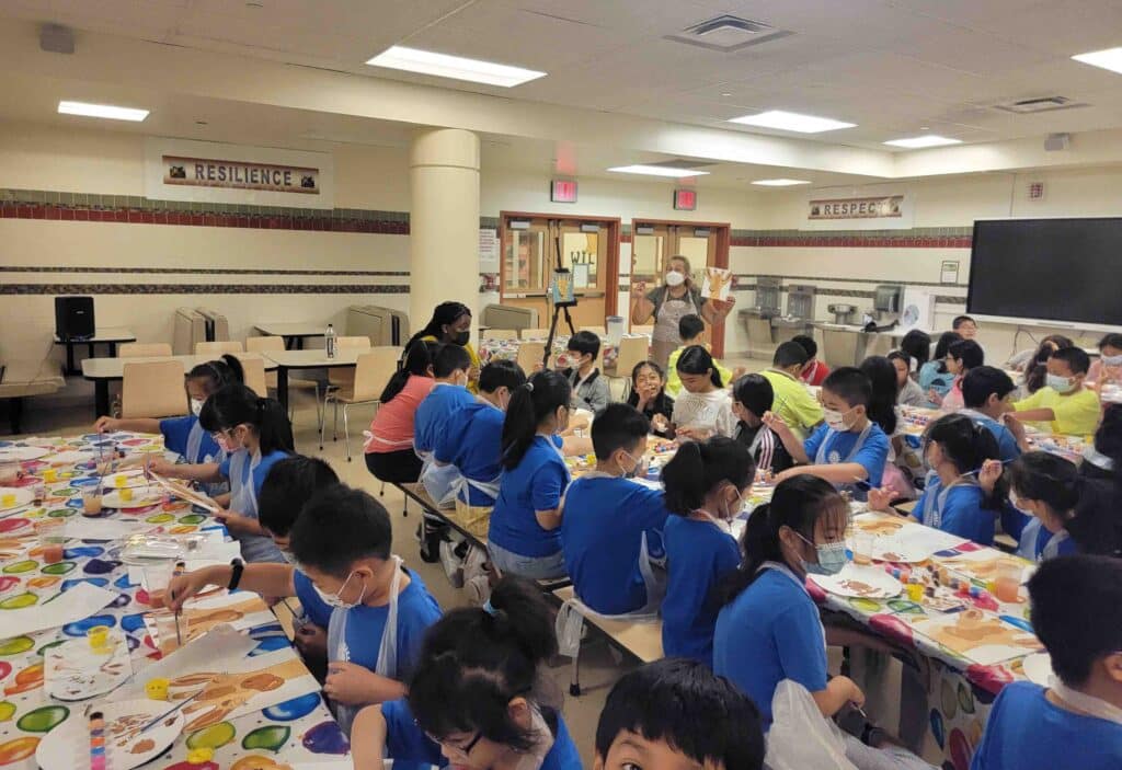 Kids in school cafeteria during a field trip